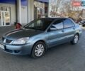 Синий Мицубиси Лансер, объемом двигателя 1.58 л и пробегом 166 тыс. км за 5500 $, фото 1 на Automoto.ua