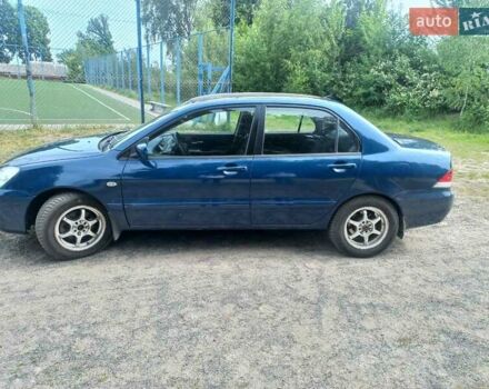 Синій Міцубісі Lancer, об'ємом двигуна 1.6 л та пробігом 275 тис. км за 5100 $, фото 5 на Automoto.ua