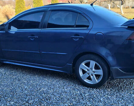 Синий Мицубиси Лансер, объемом двигателя 1.5 л и пробегом 241 тыс. км за 6500 $, фото 2 на Automoto.ua