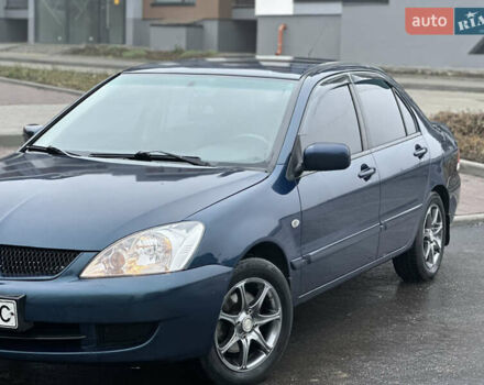 Синий Мицубиси Лансер, объемом двигателя 1.6 л и пробегом 187 тыс. км за 3799 $, фото 2 на Automoto.ua