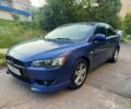 Синій Міцубісі Lancer, об'ємом двигуна 2 л та пробігом 185 тис. км за 4650 $, фото 12 на Automoto.ua
