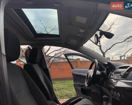 Синий Мицубиси Лансер, объемом двигателя 1.5 л и пробегом 263 тыс. км за 6700 $, фото 26 на Automoto.ua