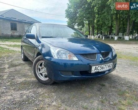 Синій Міцубісі Lancer, об'ємом двигуна 1.6 л та пробігом 275 тис. км за 5100 $, фото 3 на Automoto.ua