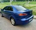 Синій Міцубісі Lancer, об'ємом двигуна 2 л та пробігом 185 тис. км за 4650 $, фото 6 на Automoto.ua