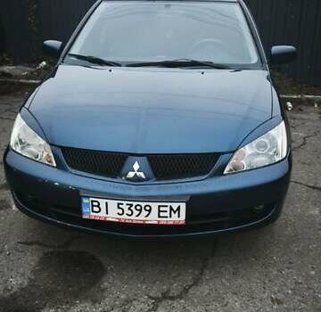 Синій Міцубісі Lancer, об'ємом двигуна 1.6 л та пробігом 206 тис. км за 5500 $, фото 11 на Automoto.ua