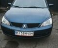 Синій Міцубісі Lancer, об'ємом двигуна 1.6 л та пробігом 206 тис. км за 5500 $, фото 11 на Automoto.ua