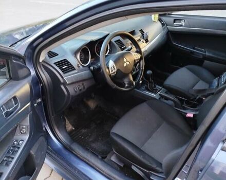 Синій Міцубісі Lancer, об'ємом двигуна 2 л та пробігом 290 тис. км за 5000 $, фото 9 на Automoto.ua