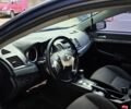 Синий Мицубиси Лансер, объемом двигателя 2 л и пробегом 140 тыс. км за 3000 $, фото 14 на Automoto.ua