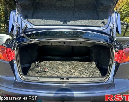 Синій Міцубісі Lancer, об'ємом двигуна 2 л та пробігом 207 тис. км за 7500 $, фото 5 на Automoto.ua