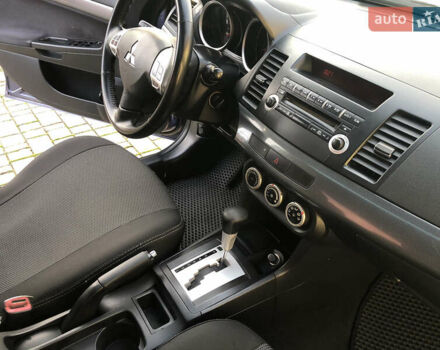 Синий Мицубиси Лансер, объемом двигателя 1.5 л и пробегом 263 тыс. км за 6700 $, фото 61 на Automoto.ua