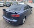 Синий Мицубиси Лансер, объемом двигателя 2 л и пробегом 142 тыс. км за 8000 $, фото 5 на Automoto.ua