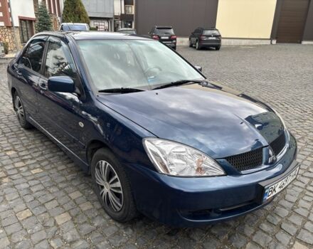 Міцубісі Lancer 2008 у Рівному на Automoto.ua Синій Міцубісі Lancer, об'ємом двигуна 1.6 л та пробігом 158 тис. км за 3900 $, фото 11 на Automoto.ua