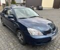 Міцубісі Lancer 2008 у Рівному на Automoto.ua Синій Міцубісі Lancer, об'ємом двигуна 1.6 л та пробігом 158 тис. км за 3900 $, фото 11 на Automoto.ua