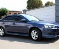 Синій Міцубісі Lancer, об'ємом двигуна 2 л та пробігом 243 тис. км за 6601 $, фото 1 на Automoto.ua