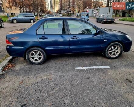 Синій Міцубісі Lancer, об'ємом двигуна 1.6 л та пробігом 298 тис. км за 2998 $, фото 8 на Automoto.ua