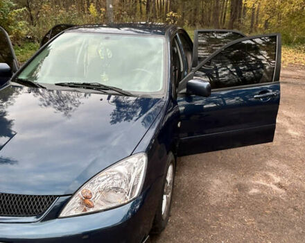 Синий Мицубиси Лансер, объемом двигателя 1.6 л и пробегом 150 тыс. км за 5700 $, фото 27 на Automoto.ua