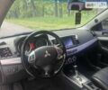 Синій Міцубісі Lancer, об'ємом двигуна 2 л та пробігом 130 тис. км за 7800 $, фото 4 на Automoto.ua