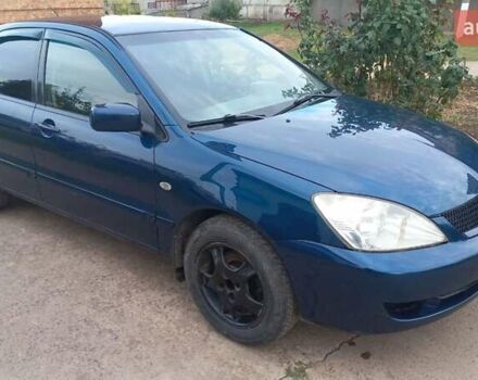 Синій Міцубісі Lancer, об'ємом двигуна 1.58 л та пробігом 220 тис. км за 4200 $, фото 1 на Automoto.ua