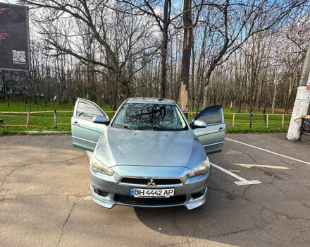 Синий Мицубиси Лансер, объемом двигателя 1.5 л и пробегом 250 тыс. км за 5150 $, фото 6 на Automoto.ua