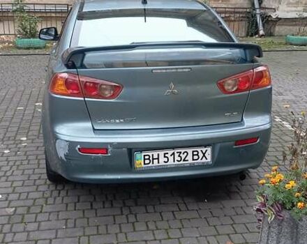 Синий Мицубиси Лансер, объемом двигателя 2 л и пробегом 300 тыс. км за 6900 $, фото 2 на Automoto.ua