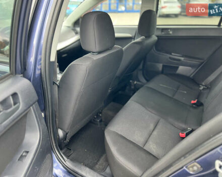 Міцубісі Lancer 2008 у Києві на Automoto.ua Синій Міцубісі Lancer, об'ємом двигуна 2 л та пробігом 265 тис. км за 6250 $, фото 12 на Automoto.ua