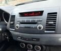 Синий Мицубиси Лансер, объемом двигателя 2 л и пробегом 205 тыс. км за 5899 $, фото 21 на Automoto.ua