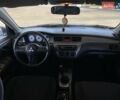 Синий Мицубиси Лансер, объемом двигателя 1.58 л и пробегом 166 тыс. км за 5500 $, фото 24 на Automoto.ua