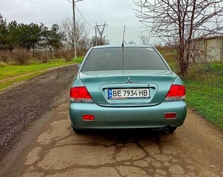 Синий Мицубиси Лансер, объемом двигателя 1.6 л и пробегом 167 тыс. км за 4700 $, фото 4 на Automoto.ua