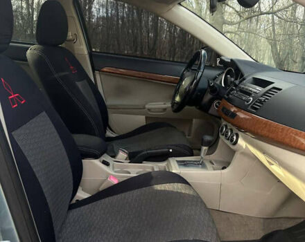 Синий Мицубиси Лансер, объемом двигателя 1.5 л и пробегом 250 тыс. км за 5150 $, фото 13 на Automoto.ua