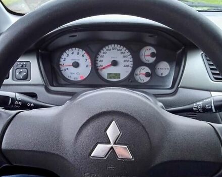 Синий Мицубиси Лансер, объемом двигателя 1.6 л и пробегом 167 тыс. км за 4700 $, фото 10 на Automoto.ua