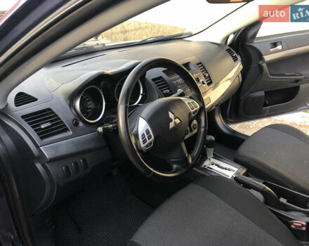 Синий Мицубиси Лансер, объемом двигателя 1.5 л и пробегом 263 тыс. км за 6700 $, фото 58 на Automoto.ua