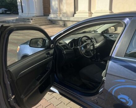 Синий Мицубиси Лансер, объемом двигателя 2 л и пробегом 3 тыс. км за 4200 $, фото 6 на Automoto.ua