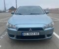 Синий Мицубиси Лансер, объемом двигателя 2 л и пробегом 235 тыс. км за 4300 $, фото 1 на Automoto.ua