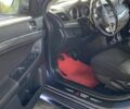 Синий Мицубиси Лансер, объемом двигателя 2 л и пробегом 245 тыс. км за 5500 $, фото 5 на Automoto.ua