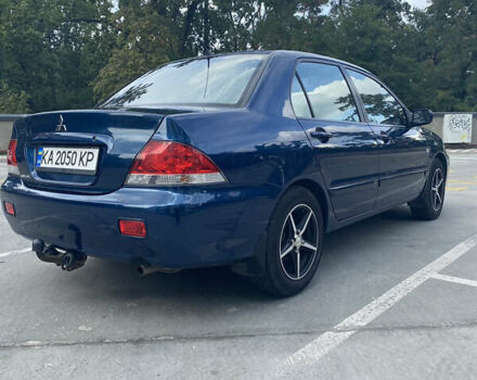 Синій Міцубісі Lancer, об'ємом двигуна 1.6 л та пробігом 206 тис. км за 5500 $, фото 7 на Automoto.ua