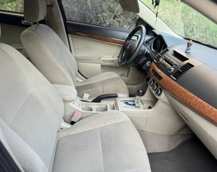 Синій Міцубісі Lancer, об'ємом двигуна 2 л та пробігом 185 тис. км за 4650 $, фото 11 на Automoto.ua