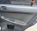 Синий Мицубиси Лансер, объемом двигателя 2 л и пробегом 140 тыс. км за 3300 $, фото 12 на Automoto.ua
