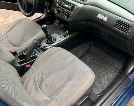 Синий Мицубиси Лансер, объемом двигателя 1.6 л и пробегом 150 тыс. км за 5700 $, фото 37 на Automoto.ua