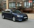 Синий Мицубиси Лансер, объемом двигателя 2 л и пробегом 250 тыс. км за 5600 $, фото 1 на Automoto.ua