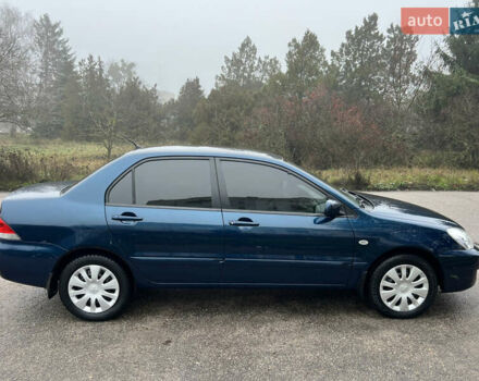 Синий Мицубиси Лансер, объемом двигателя 1.59 л и пробегом 126 тыс. км за 5950 $, фото 7 на Automoto.ua