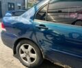 Синий Мицубиси Лансер, объемом двигателя 1.6 л и пробегом 258 тыс. км за 3800 $, фото 2 на Automoto.ua