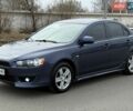 Синий Мицубиси Лансер, объемом двигателя 2 л и пробегом 290 тыс. км за 6999 $, фото 3 на Automoto.ua
