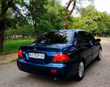 Синій Міцубісі Lancer, об'ємом двигуна 1.6 л та пробігом 225 тис. км за 4250 $, фото 5 на Automoto.ua