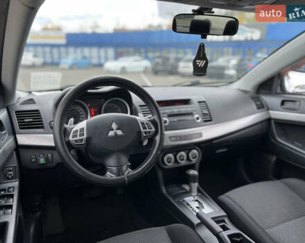 Міцубісі Lancer 2008 у Києві на Automoto.ua Синій Міцубісі Lancer, об'ємом двигуна 2 л та пробігом 265 тис. км за 6250 $, фото 11 на Automoto.ua