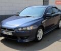 Синий Мицубиси Лансер, объемом двигателя 2 л и пробегом 243 тыс. км за 6900 $, фото 3 на Automoto.ua