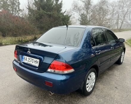 Синій Міцубісі Lancer, об'ємом двигуна 1.6 л та пробігом 126 тис. км за 5950 $, фото 6 на Automoto.ua