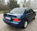 Синій Міцубісі Lancer, об'ємом двигуна 1.6 л та пробігом 126 тис. км за 5950 $, фото 6 на Automoto.ua