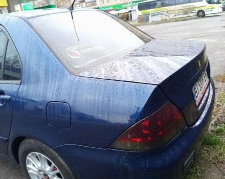 Синій Міцубісі Lancer, об'ємом двигуна 1.6 л та пробігом 206 тис. км за 5500 $, фото 7 на Automoto.ua