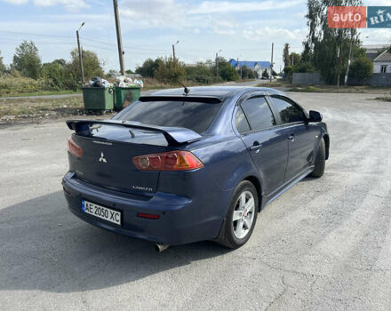 Синий Мицубиси Лансер, объемом двигателя 2 л и пробегом 248 тыс. км за 6600 $, фото 7 на Automoto.ua