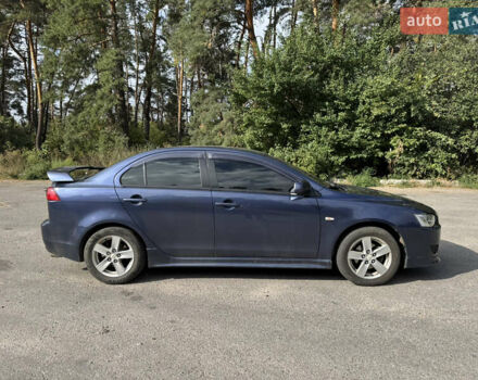 Синий Мицубиси Лансер, объемом двигателя 2 л и пробегом 299 тыс. км за 7100 $, фото 5 на Automoto.ua